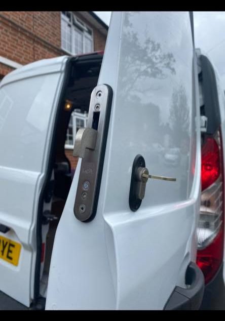 van back door protected by hook lock